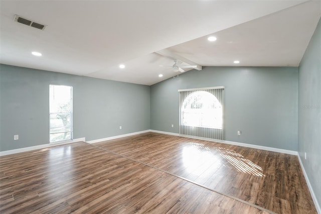 10237 Bannock St, Spring Hill, FL 34608 - empty room featuring wood finished floors, lofted ceiling with beams, ceiling fan, baseboards, and visible vents
