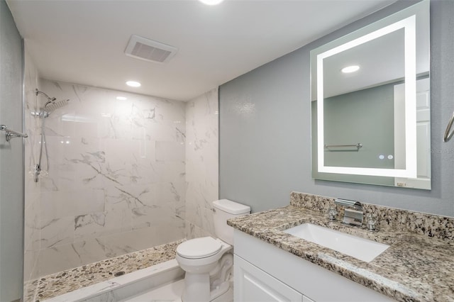 10237 Bannock St, Spring Hill, FL 34608 - full bath featuring a stall shower, toilet, visible vents, recessed lighting, and vanity
