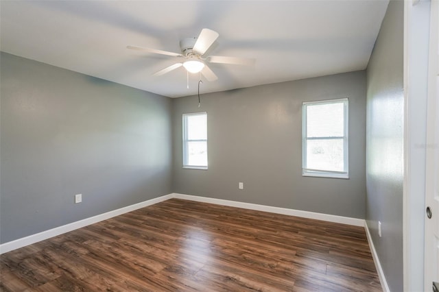 10237 Bannock St, Spring Hill, FL 34608 - empty room with baseboards, a ceiling fan, and dark wood-style floors