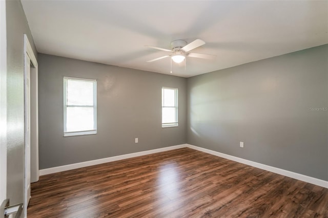 10237 Bannock St, Spring Hill, FL 34608 - empty room featuring dark wood finished floors, a ceiling fan, and baseboards