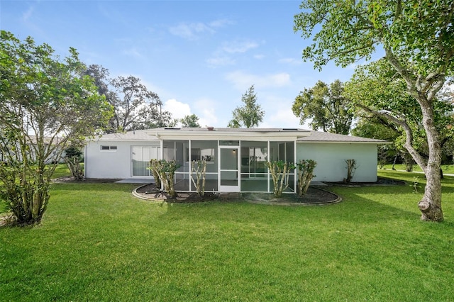 10237 Bannock St, Spring Hill, FL 34608 - rear view of house featuring stucco siding, a sunroom, and a yard
