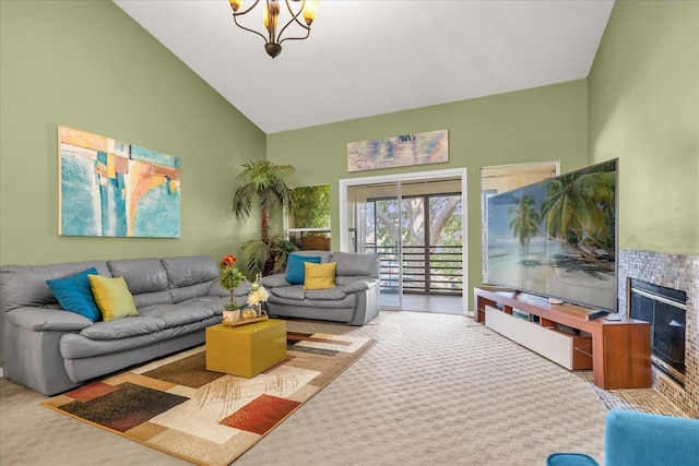 carpeted living room featuring high vaulted ceiling, a chandelier, and a tile fireplace