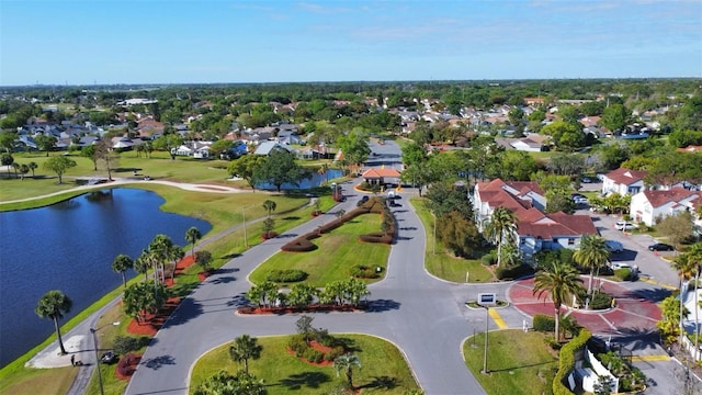aerial view with a residential view and a water view