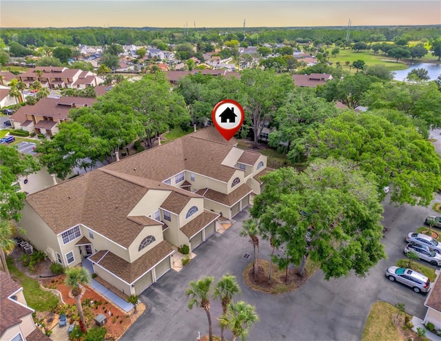 6147 Sunnyvale Dr Unit Ge, Orlando, FL 32822 - aerial view at dusk of a residential view and a water view