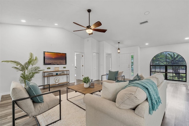 living room with baseboards, visible vents, recessed lighting, a ceiling fan, and wood finished floors