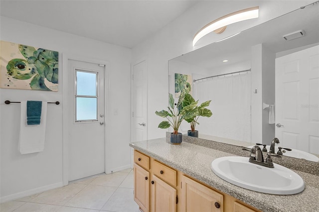 full bath with vanity, baseboards, tile patterned flooring, and a shower with shower curtain