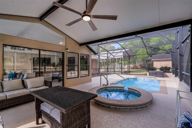 view of pool with glass enclosure, outdoor lounge area, a patio area, a ceiling fan, and a pool with connected hot tub