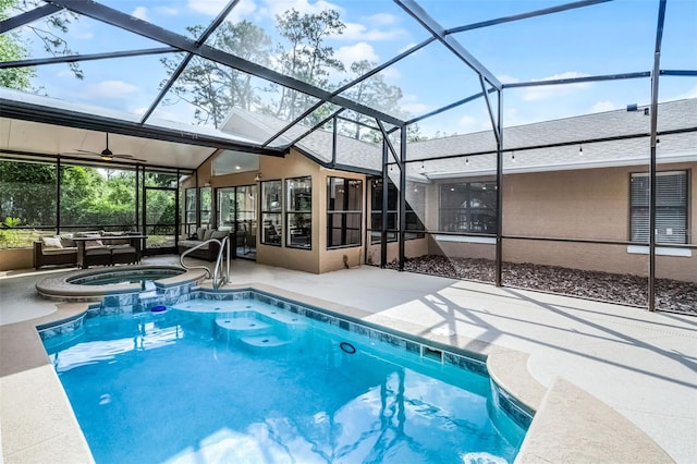 view of swimming pool featuring a lanai, an outdoor living space, a patio area, and a pool with connected hot tub
