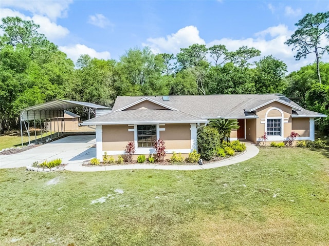 single story home with a detached carport, concrete driveway, a shingled roof, a front yard, and stucco siding