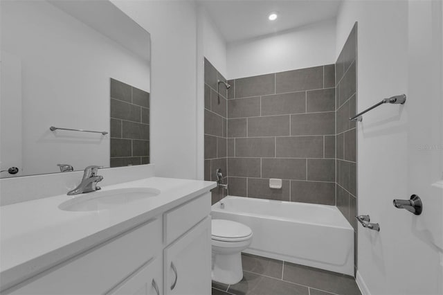 bathroom with recessed lighting, tile patterned flooring, shower / bathtub combination, toilet, and vanity