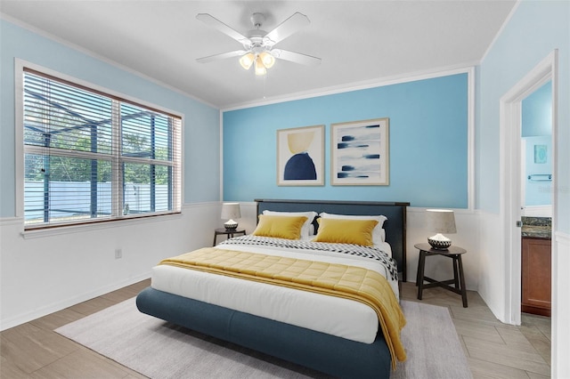 bedroom with crown molding and a ceiling fan