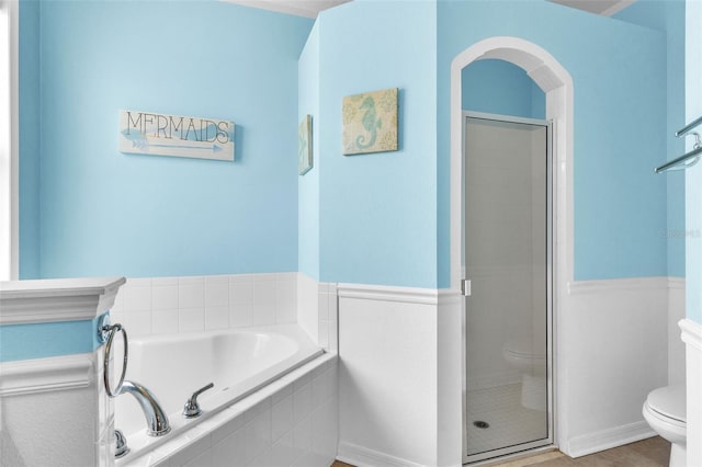 full bath with toilet, a shower stall, and a bath