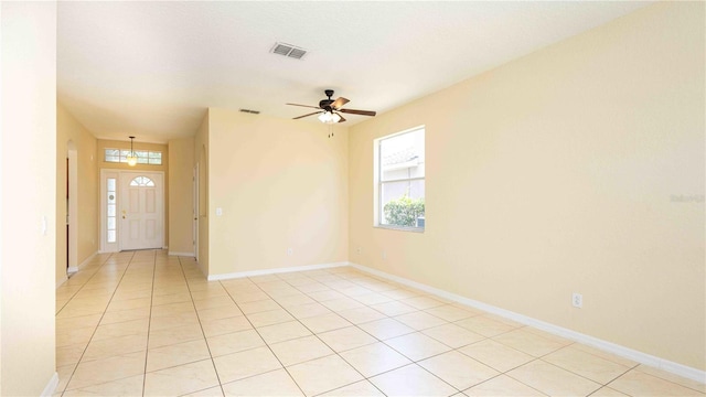 1204 Blackheath Ct, Davenport, FL 33897 - spare room featuring light tile patterned floors and ceiling fan