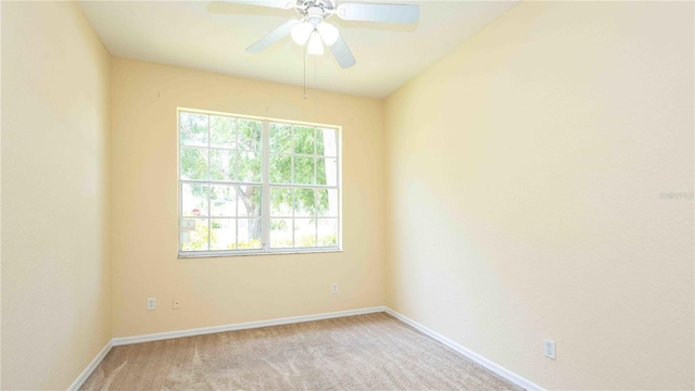 1204 Blackheath Ct, Davenport, FL 33897 - spare room with light colored carpet and ceiling fan