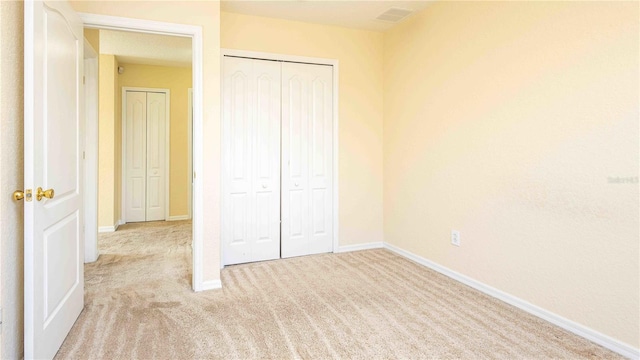 1204 Blackheath Ct, Davenport, FL 33897 - unfurnished bedroom featuring carpet flooring and a closet
