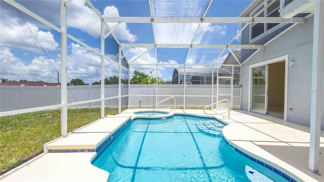 1204 Blackheath Ct, Davenport, FL 33897 - view of pool with a fenced backyard, a patio, glass enclosure, and a pool with connected hot tub