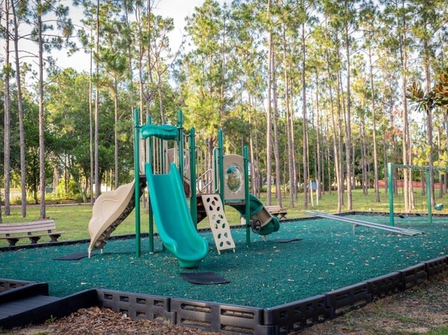 1204 Blackheath Ct, Davenport, FL 33897 - community play area with a lawn