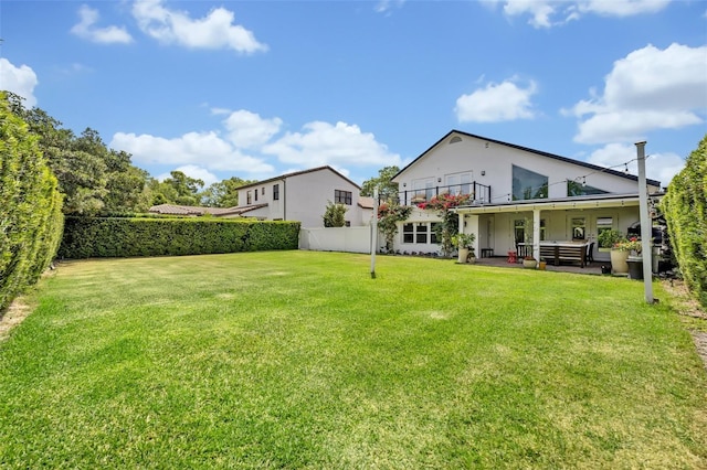 1661 Woodland Ave, Winter Park, FL 32789 - rear view of house featuring a patio area, fence, and a yard