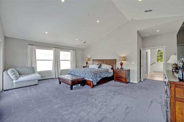 1661 Woodland Ave, Winter Park, FL 32789 - bedroom with multiple windows, carpet, vaulted ceiling, and visible vents