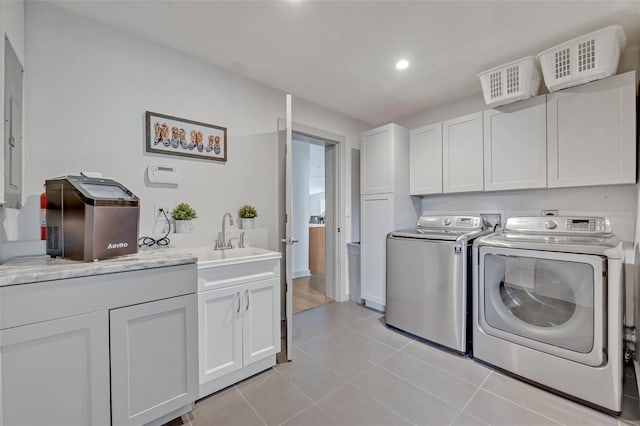 1661 Woodland Ave, Winter Park, FL 32789 - laundry area with recessed lighting, a sink, cabinet space, independent washer and dryer, and light tile patterned floors