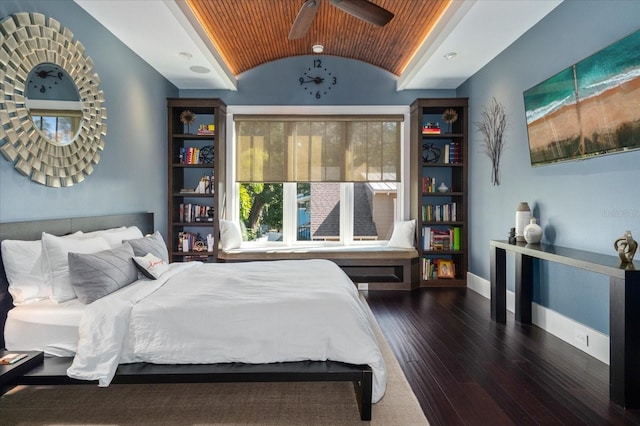 bedroom with vaulted ceiling, hardwood / wood-style floors, ceiling fan, wooden ceiling, and baseboards