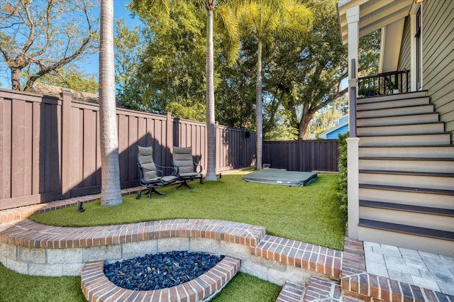 view of yard with a fenced backyard