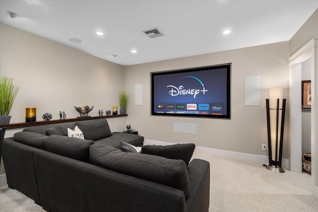 carpeted cinema with recessed lighting, visible vents, and baseboards