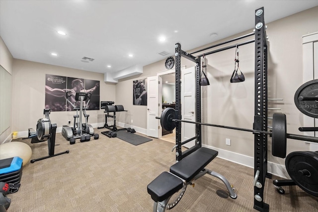 exercise area featuring visible vents, baseboards, recessed lighting, and carpet flooring
