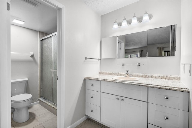 11 Escondido Cir Unit 110, Altamonte Springs, FL 32701 - bathroom featuring vanity, a stall shower, tile patterned flooring, and a textured ceiling