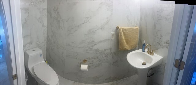 half bathroom with toilet