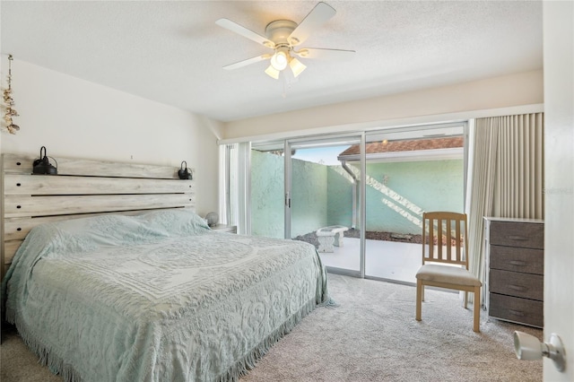 bedroom featuring carpet, access to exterior, and ceiling fan