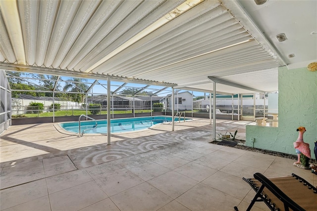 view of swimming pool with a fenced in pool, a lanai, and a patio