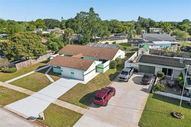 birds eye view of property with a residential view