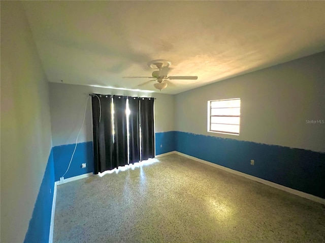 1221 Oak Haven Dr, Altamonte Springs, FL 32714 - unfurnished room featuring speckled floor, ceiling fan, and baseboards