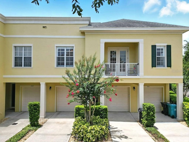 1845 Common Way Rd Unit 28-206, Orlando, FL 32814 - view of front of home with an attached garage and stucco siding