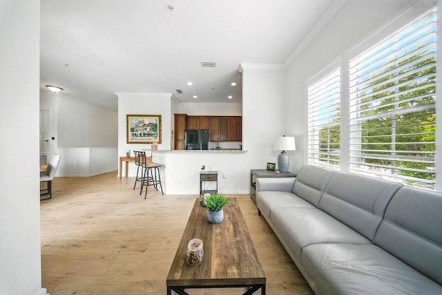1845 Common Way Rd Unit 28-206, Orlando, FL 32814 - living area with crown molding and light wood finished floors