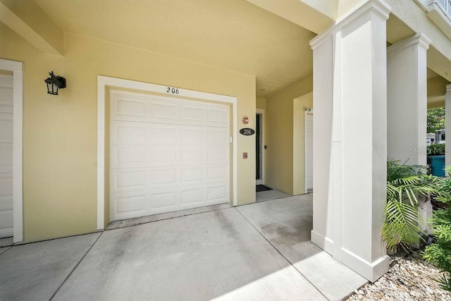 1845 Common Way Rd Unit 28-206, Orlando, FL 32814 - entrance to property with stucco siding and concrete driveway