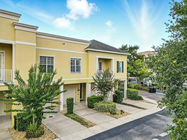 1845 Common Way Rd Unit 28-206, Orlando, FL 32814 - multi unit property with stucco siding, a garage, and driveway
