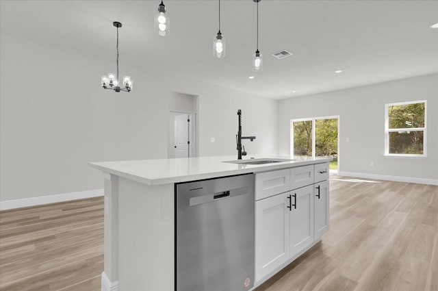 15823 SW 27th Avenue Rd, Ocala, FL 34473 - kitchen with a sink, light wood-style flooring, dishwasher, and light countertops