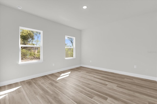 15823 SW 27th Avenue Rd, Ocala, FL 34473 - spare room featuring recessed lighting, baseboards, and light wood-style flooring