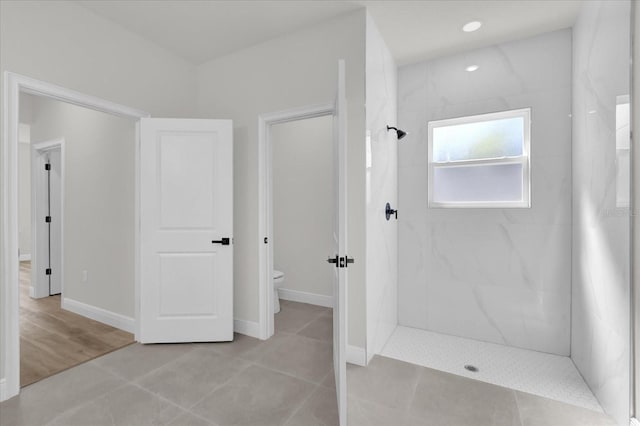 15823 SW 27th Avenue Rd, Ocala, FL 34473 - full bath featuring tile patterned flooring, baseboards, toilet, and tiled shower