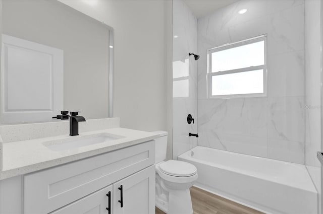 15823 SW 27th Avenue Rd, Ocala, FL 34473 - full bathroom with toilet, wood finished floors, shower / bathing tub combination, and vanity