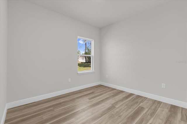 15823 SW 27th Avenue Rd, Ocala, FL 34473 - unfurnished room with baseboards and light wood finished floors