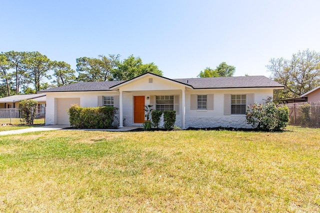 730 Georgia Ave, Longwood, FL 32750 - ranch-style house featuring a garage, driveway, a front lawn, and fence