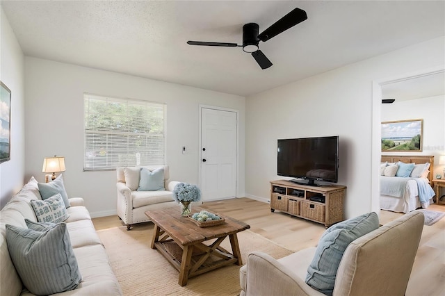 730 Georgia Ave, Longwood, FL 32750 - living area featuring ceiling fan, baseboards, and light wood finished floors