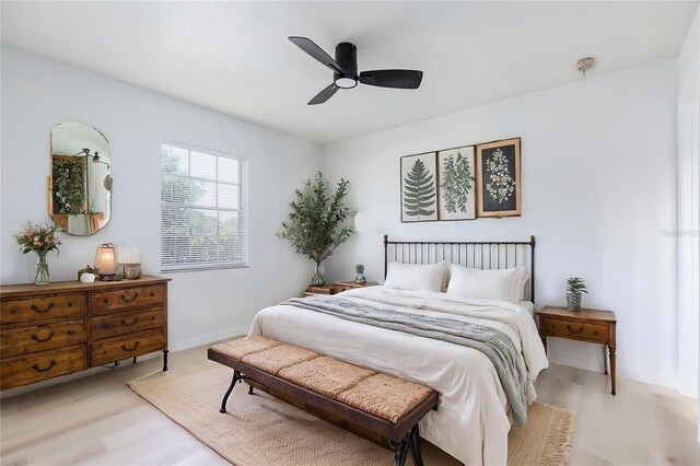 730 Georgia Ave, Longwood, FL 32750 - bedroom with ceiling fan, baseboards, and light wood-style flooring