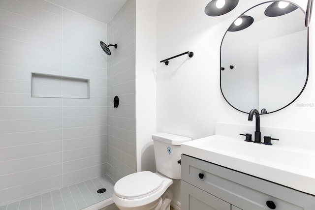 730 Georgia Ave, Longwood, FL 32750 - full bathroom with a tile shower, toilet, and vanity