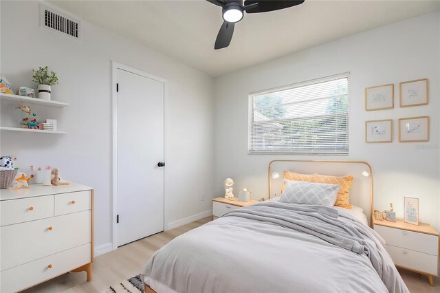 730 Georgia Ave, Longwood, FL 32750 - bedroom with visible vents, light wood finished floors, baseboards, and a ceiling fan