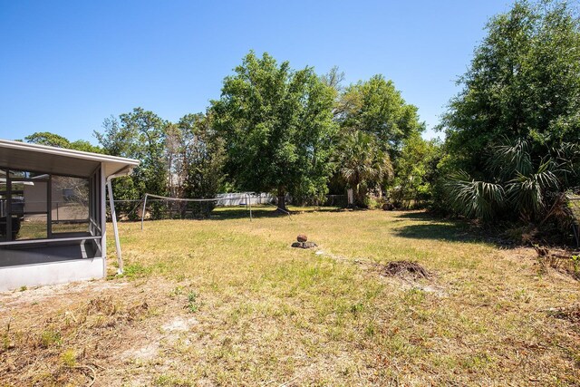 730 Georgia Ave, Longwood, FL 32750 - view of yard featuring a sunroom