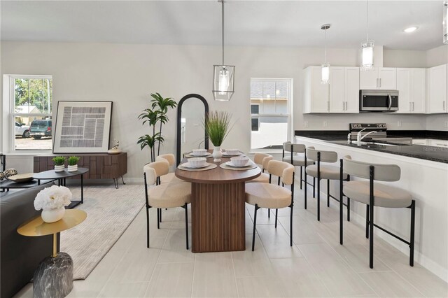 dining room featuring baseboards